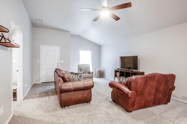 carpeted living room with vaulted ceiling and ceiling fan