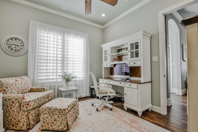 office space with ornamental molding, dark hardwood / wood-style floors, and ceiling fan