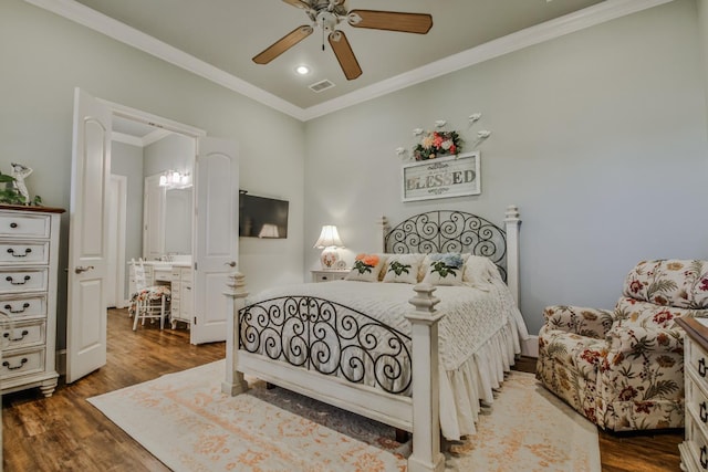 bedroom with ceiling fan, ornamental molding, and dark hardwood / wood-style flooring