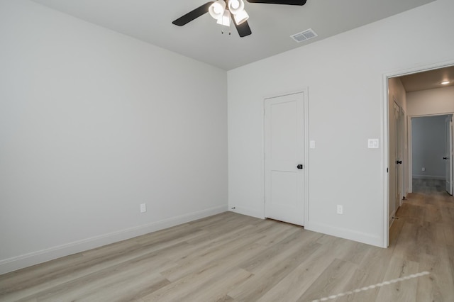 unfurnished bedroom featuring ceiling fan and light hardwood / wood-style flooring