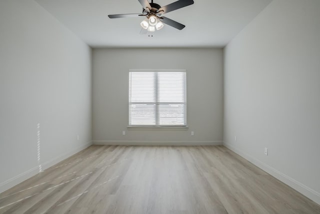 spare room featuring ceiling fan and light hardwood / wood-style floors