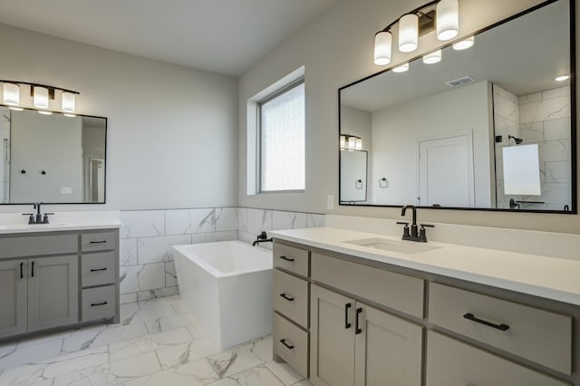 bathroom with vanity, tile walls, and plus walk in shower