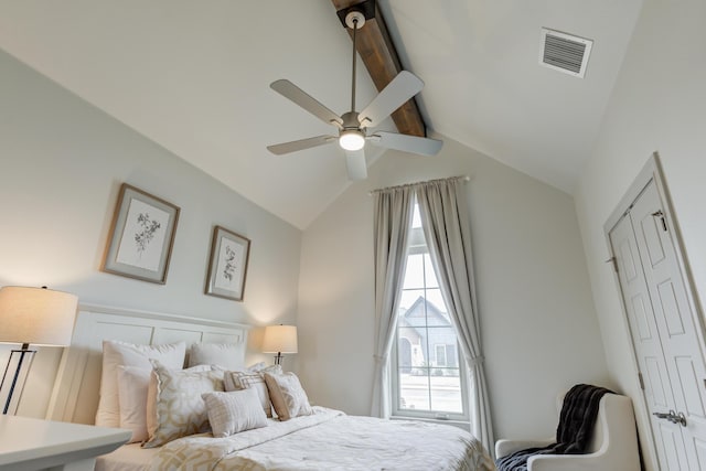 bedroom featuring visible vents, a ceiling fan, and vaulted ceiling with beams