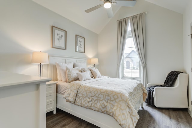 bedroom featuring dark wood-style floors, ceiling fan, and lofted ceiling
