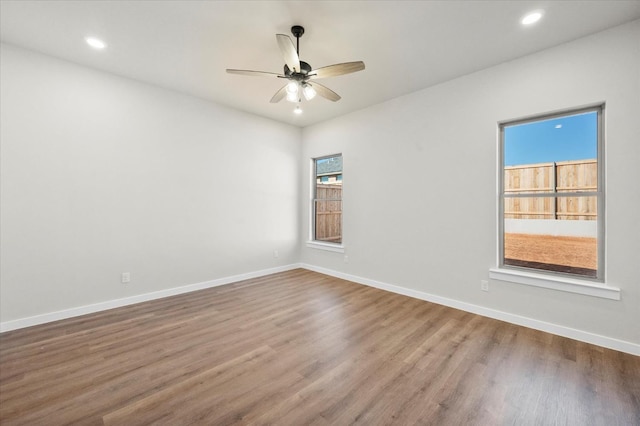 1204 E 31st St, Wolfforth, TX 79382 - spare room with hardwood / wood-style flooring and ceiling fan
