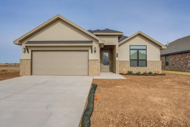 view of front of property with a garage