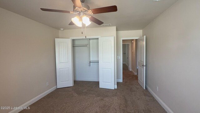 7501 100th St, Lubbock, TX 79424 - unfurnished bedroom featuring carpet floors, a closet, and ceiling fan