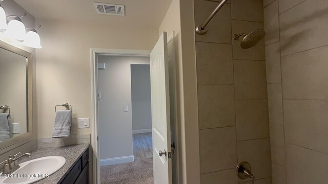 7501 100th St, Lubbock, TX 79424 - bathroom featuring vanity and baseboards
