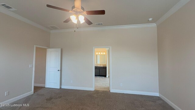 7501 100th St, Lubbock, TX 79424 - unfurnished bedroom featuring crown molding, carpet floors, and a ceiling fan