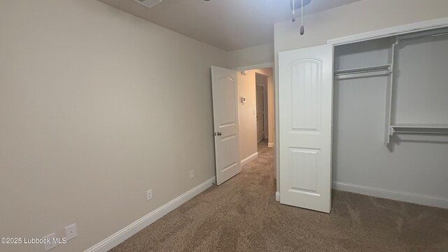 7501 100th St, Lubbock, TX 79424 - unfurnished bedroom featuring carpet floors and a closet