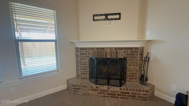 7501 100th St, Lubbock, TX 79424 - detailed view of a fireplace and carpet flooring