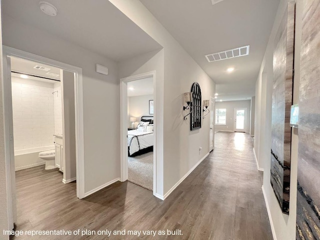 hall featuring hardwood / wood-style flooring