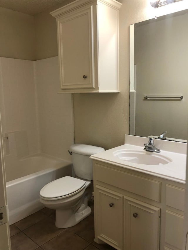 full bathroom with vanity, toilet, tub / shower combination, and tile patterned flooring