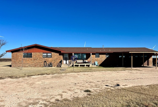 view of front of property with a carport