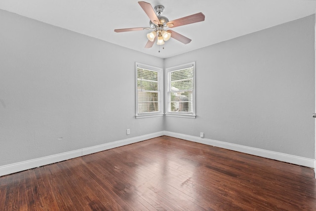 empty room featuring hardwood / wood-style flooring and ceiling fan