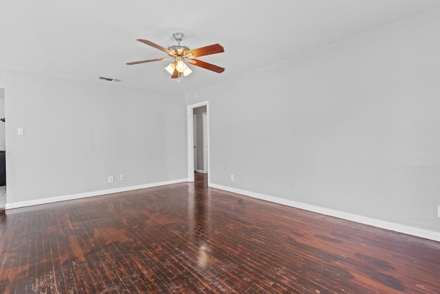 empty room with ceiling fan and wood-type flooring