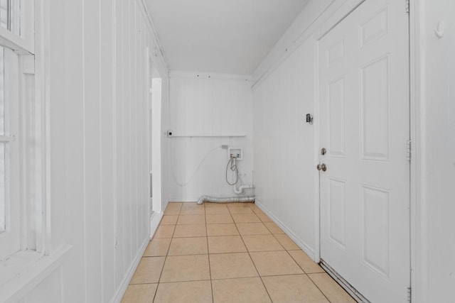 laundry area featuring light tile patterned floors