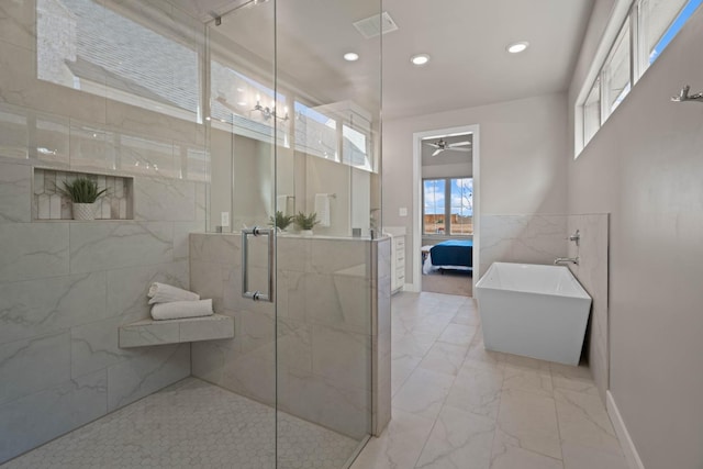 bathroom with ceiling fan and shower with separate bathtub