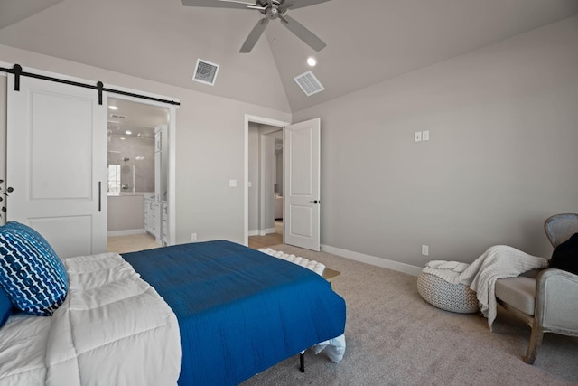 carpeted bedroom featuring ceiling fan, connected bathroom, a barn door, and high vaulted ceiling