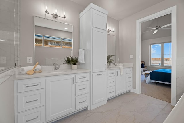 bathroom featuring vanity and ceiling fan