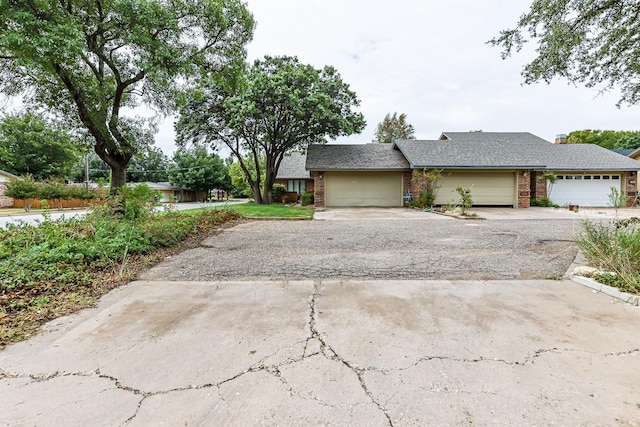 view of side of home with a garage