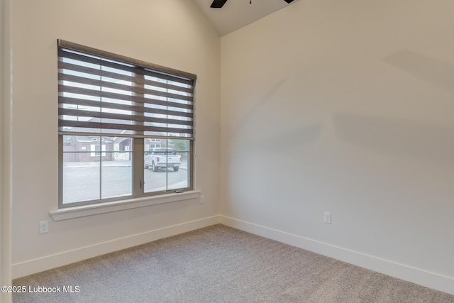 10506 Troy Ave, Lubbock, TX 79424 - unfurnished room with carpet, vaulted ceiling, ceiling fan, and baseboards