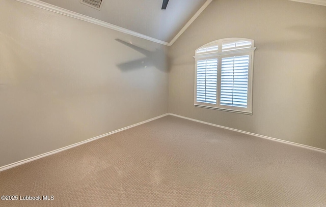 9807 Topeka Ave, Lubbock, TX 79424 - empty room with carpet floors, baseboards, lofted ceiling, visible vents, and ornamental molding