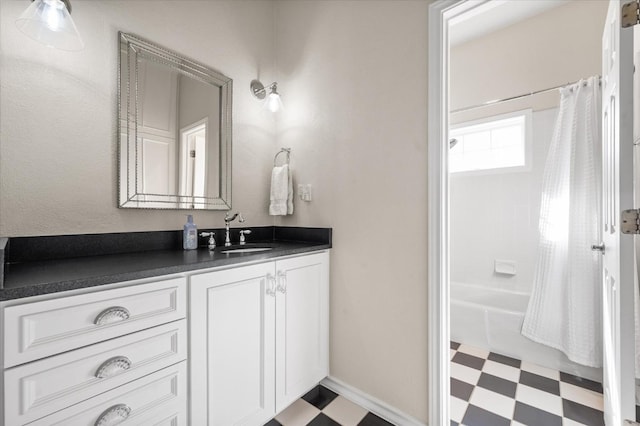 bathroom with vanity and shower / bath combo with shower curtain