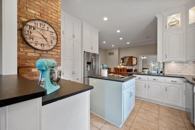 kitchen with light tile patterned floors, white cabinetry, a center island, stainless steel refrigerator with ice dispenser, and kitchen peninsula