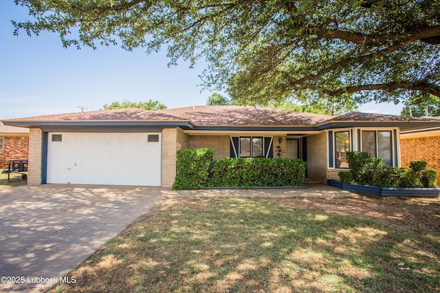 5008 59th St, Lubbock, TX 79414 - single story home featuring brick siding, a garage, and driveway