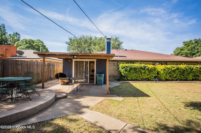 5008 59th St, Lubbock, TX 79414 - back of house with a chimney, a patio area, and french doors