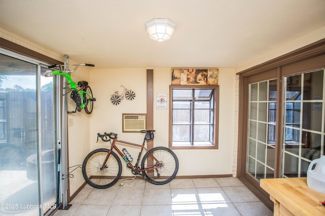 5008 59th St, Lubbock, TX 79414 - doorway to outside with light tile patterned floors and plenty of natural light