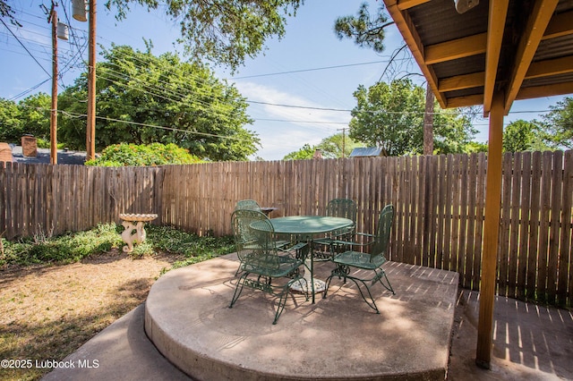 5008 59th St, Lubbock, TX 79414 - fenced backyard featuring outdoor dining space and a patio