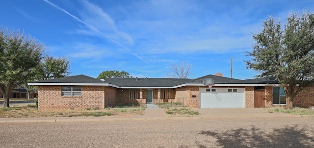 single story home with a garage