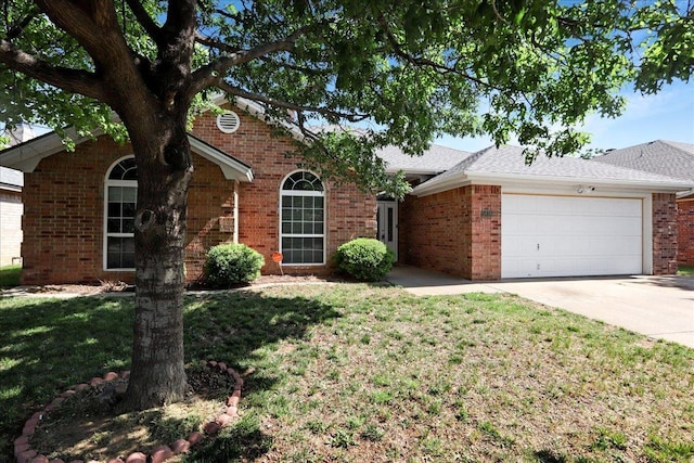 single story home with a garage and a front lawn