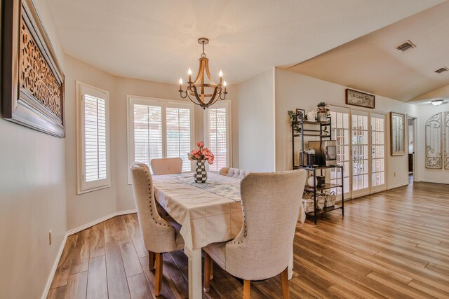 5419 87th St, Lubbock, TX 79424 - dining area with a chandelier and light wood-style floors