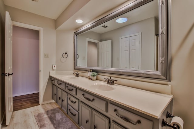 5419 87th St, Lubbock, TX 79424 - bathroom with double vanity and baseboards