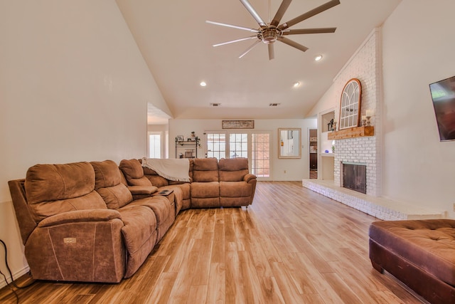 5419 87th St, Lubbock, TX 79424 - living room featuring high vaulted ceiling, a fireplace, ceiling fan, light wood-style flooring, and recessed lighting