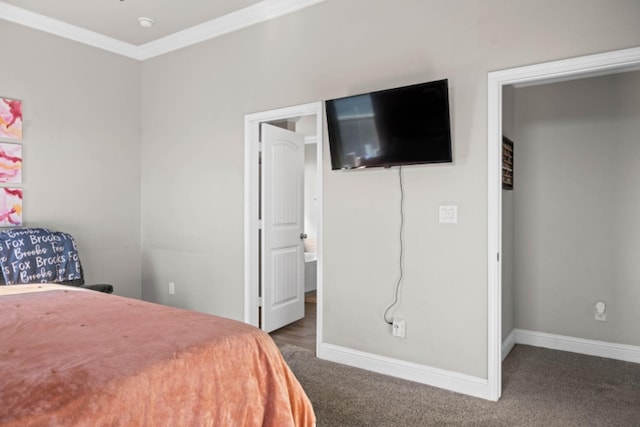 carpeted bedroom featuring crown molding