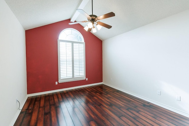 unfurnished room with dark hardwood / wood-style flooring, lofted ceiling with beams, and ceiling fan