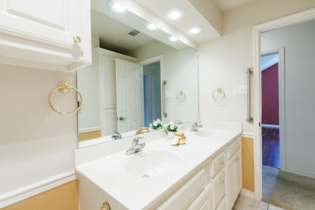 bathroom with vanity and tile patterned floors