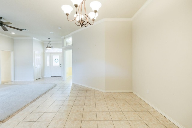 tiled empty room featuring ornamental molding and ceiling fan with notable chandelier