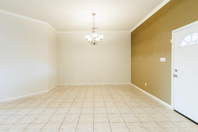 tiled empty room featuring ornamental molding and a chandelier