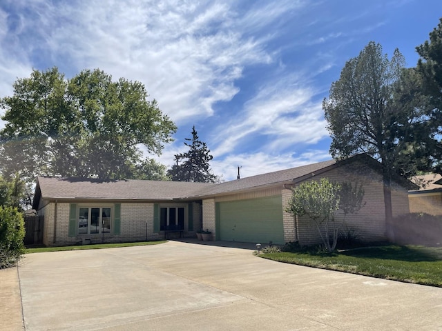 single story home with a garage