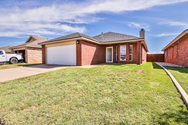 ranch-style home with a garage and a front lawn