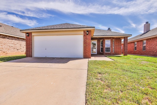 ranch-style home featuring a garage and a front lawn