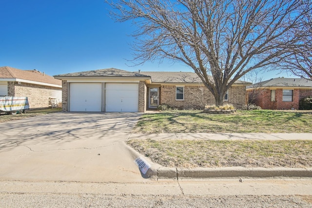 single story home with a garage