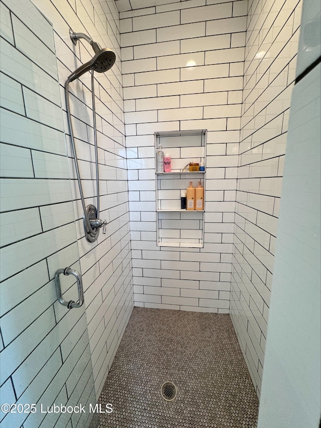 9906 Uvalde Ave, Lubbock, TX 79423 - full bathroom featuring a shower stall