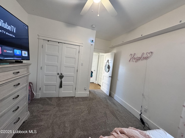 9906 Uvalde Ave, Lubbock, TX 79423 - bedroom with carpet floors, a ceiling fan, and a closet