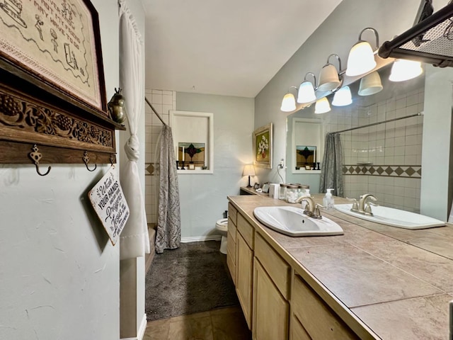 full bathroom featuring vanity, toilet, and shower / bathtub combination with curtain